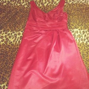 Very pretty red satin dress.